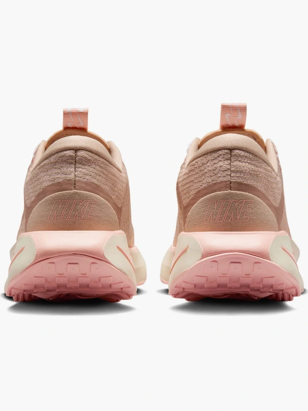 Nike Women’s Peach/Pink Wave-Soled “Motiva” Athletic Shoe